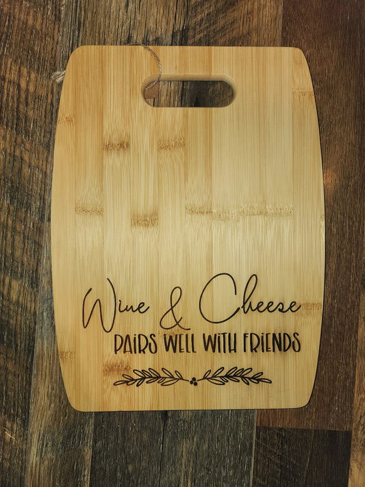 Wine and Cheese pairs well with friends,  bamboo cutting board - medium Arc